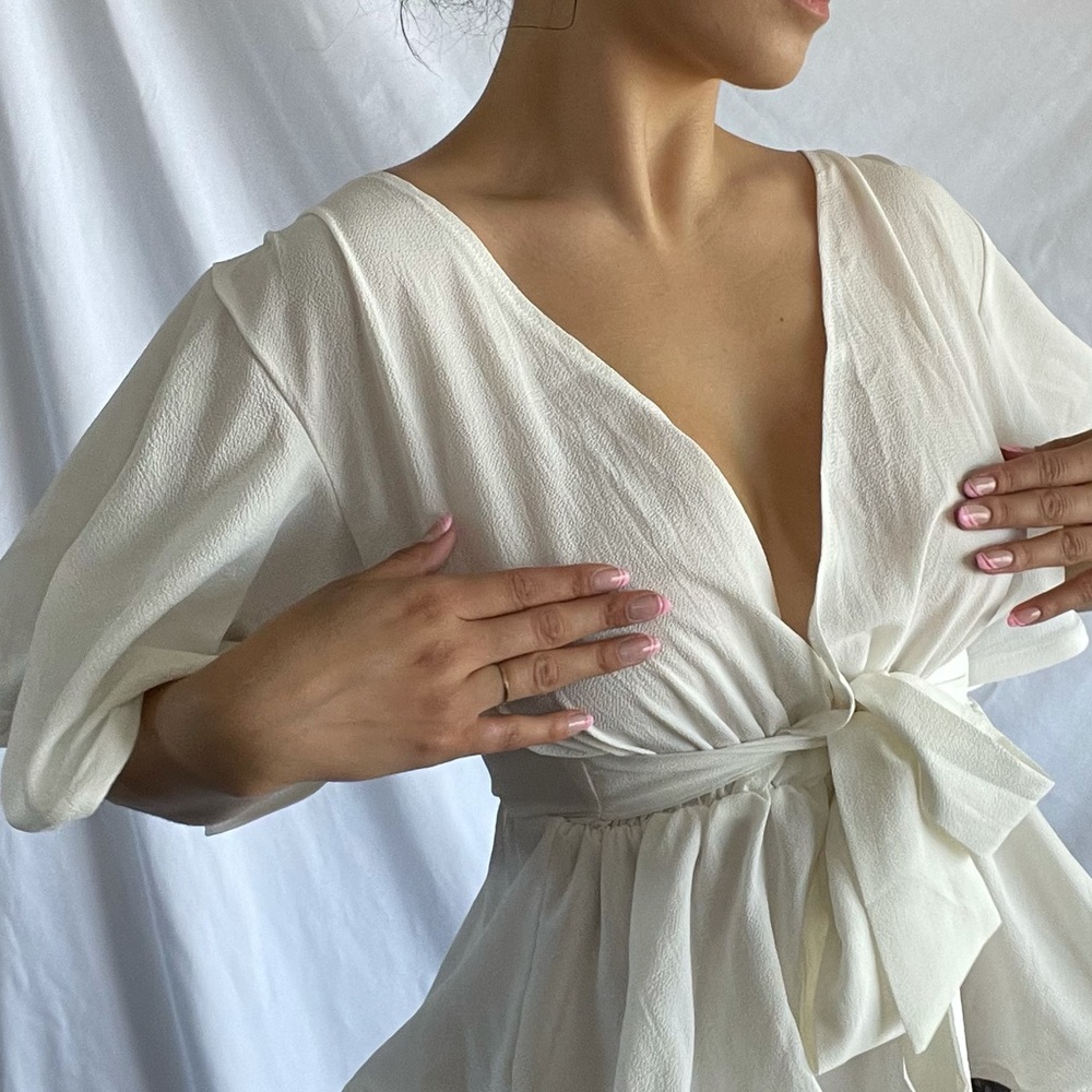 White blouse with frills